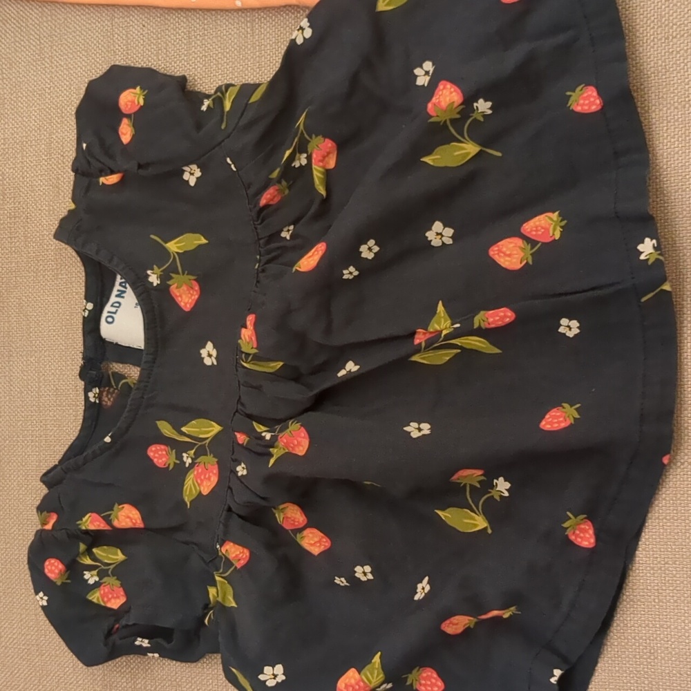 2 dresses 1 swim suit 1 oncie
